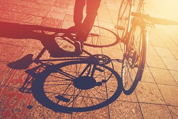 a shadow of a person riding a bike at Zeta Luxury Apartments, California, 95834